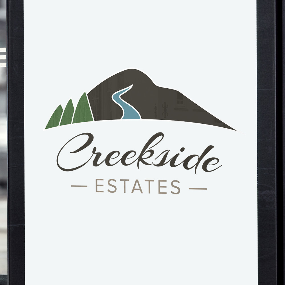 Creekside Estates logo on sign