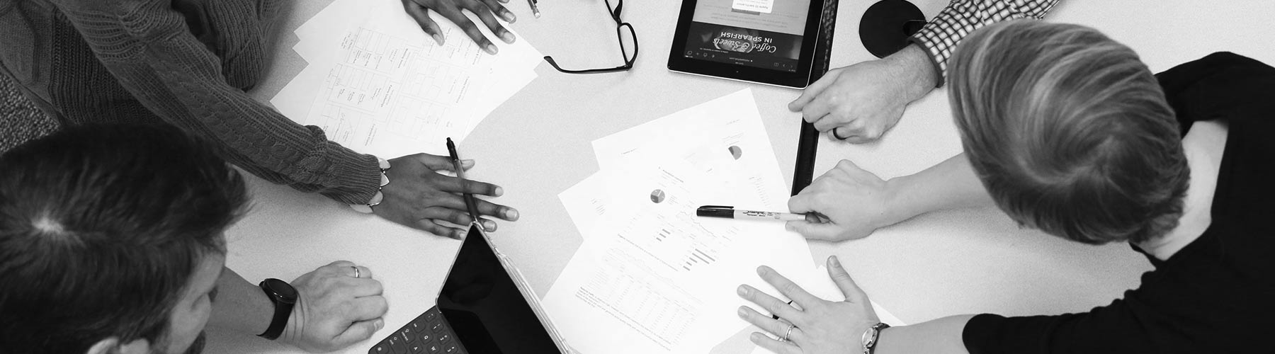 Digital Designs team members discussing a project