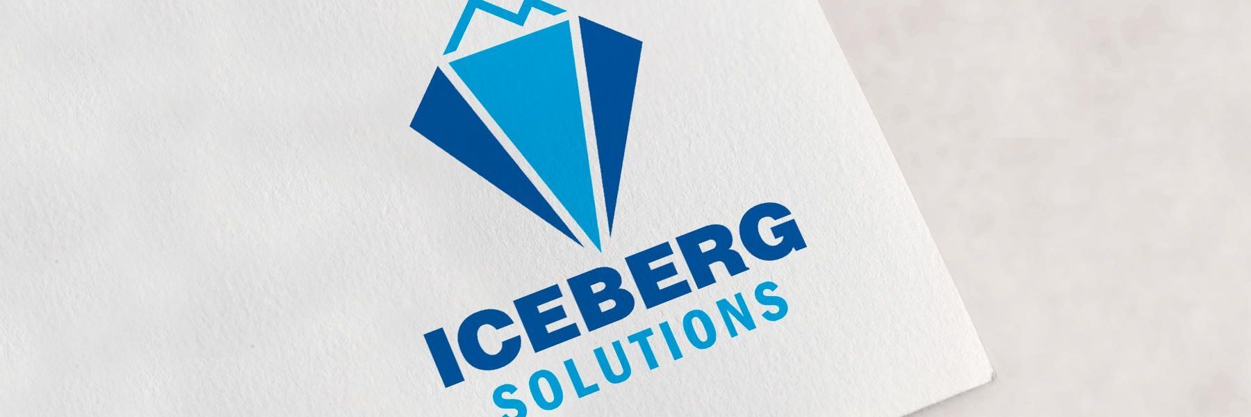 Iceberg Solutions logo on a card